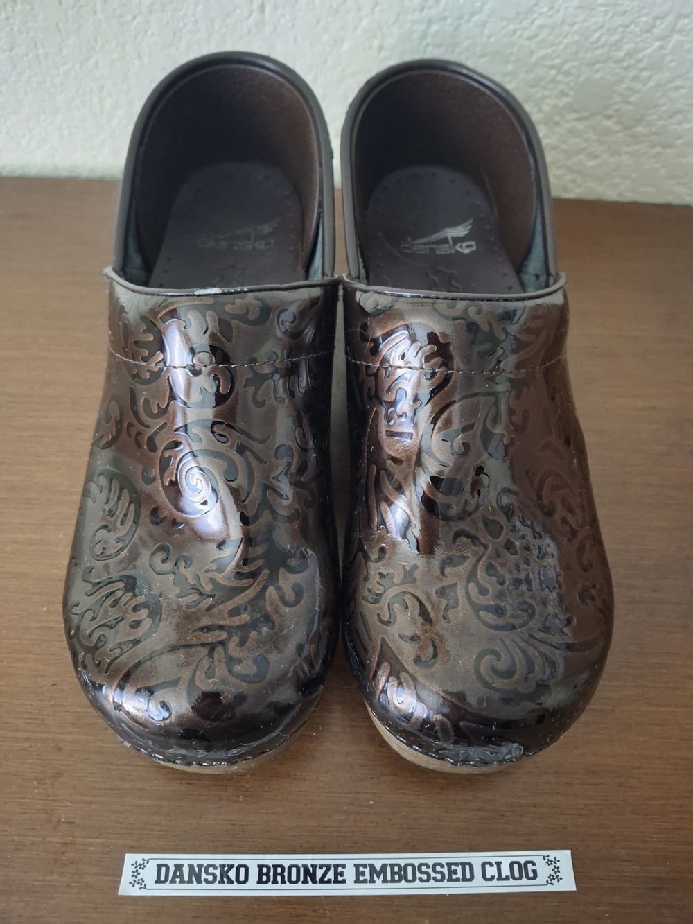 Dansko Women’s Bronze Embossed Clogs